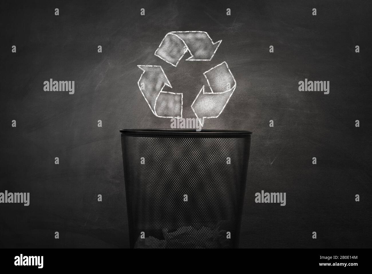 shape of the symbol of recycling on chalkboard. Protection nature and future concept Stock Photo