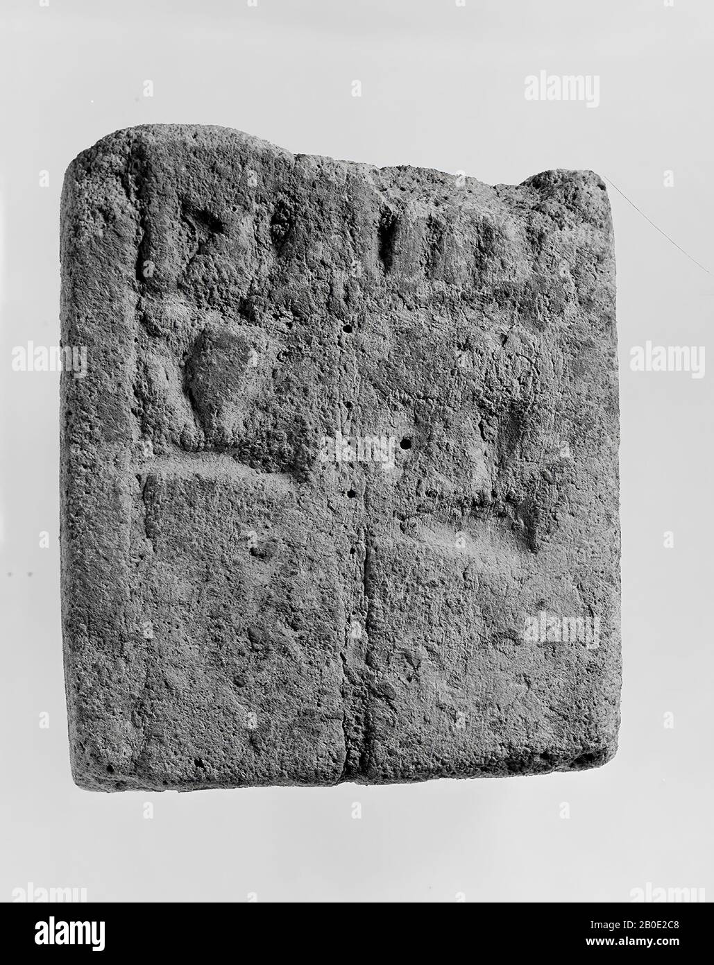 A fragment of a glazed brick with a cuneiform inscription that runs over two sides. The name Sutruk-Nahhunte comes across, probably the king of Elam (1185-1155 BC), building element, inscription, pottery, glaze, L 6.5 cm, W 7 cm, H 5.8 cm, Middle Elamite Period 1185- 1155 BC, Iran Stock Photo