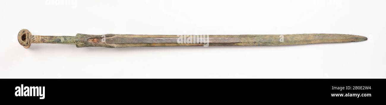 Cast a particularly long, bronze sword in one piece. The end of the hilt consists of a transversely placed tube ending in two oblique lobes., Weapon, metal, bronze, L 80 cm, W 2.5-3 cm, Iron Age I-II 1200-900 BC, Iran Stock Photo