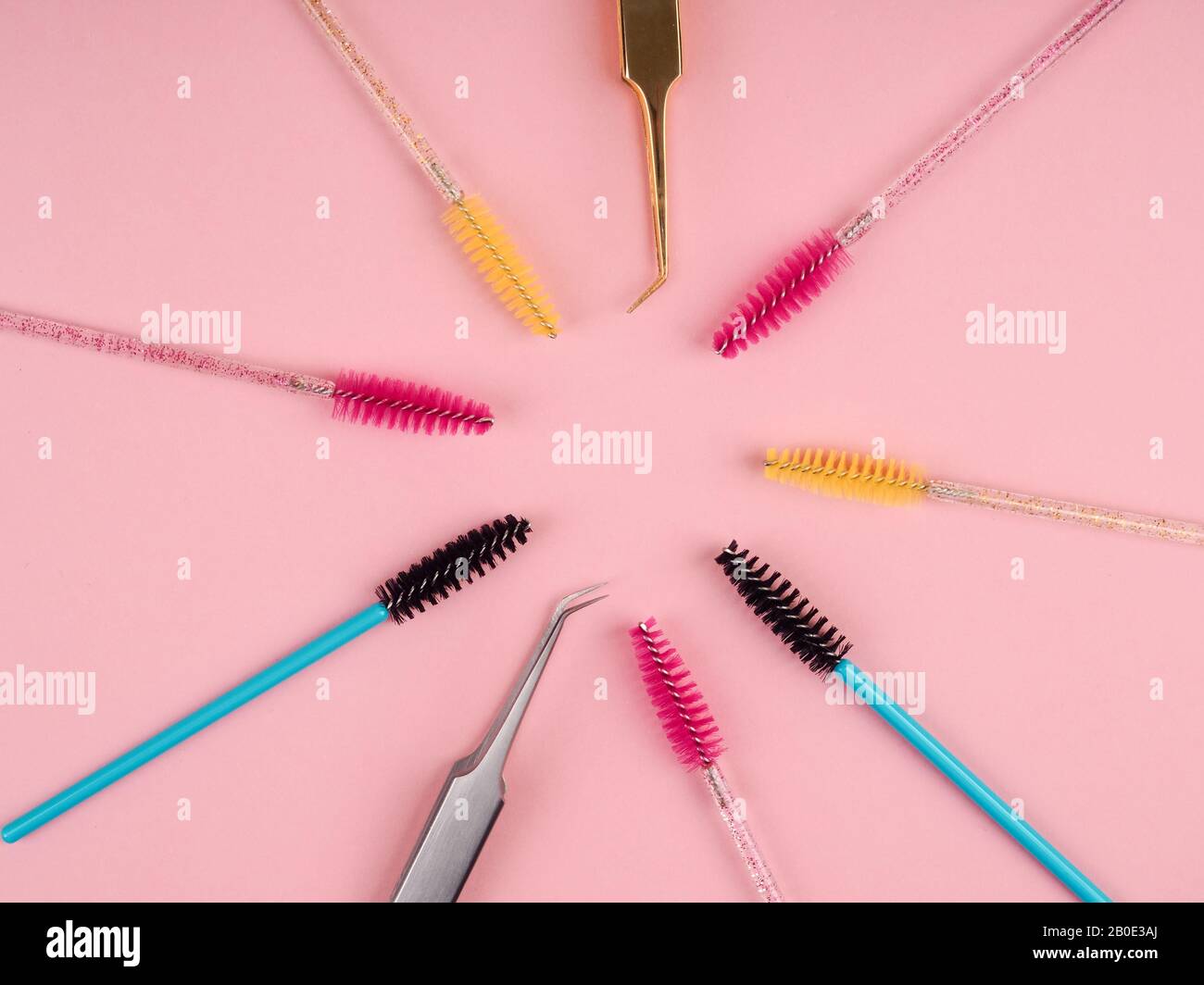 lots of eyelash tweezers, eyelash extension tools for women. Stock Photo