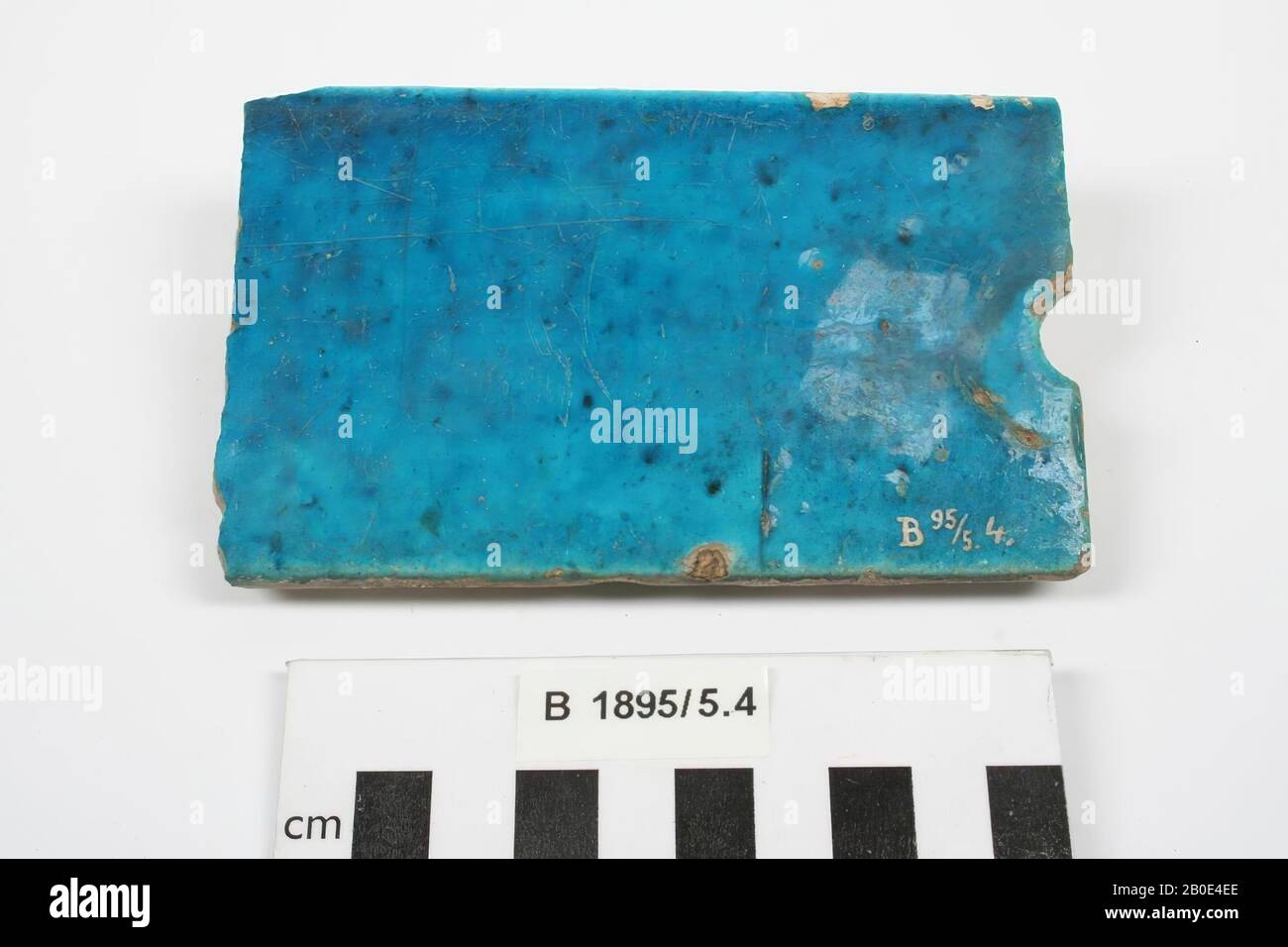 https://c8.alamy.com/comp/2B0E4EE/a-fragment-of-an-elongated-tile-with-blue-green-glaze-building-element-pottery-glaze-l-116-cm-w-7-cm-h-15-cm-islamic-period-630-1516-ad-turkey-2B0E4EE.jpg