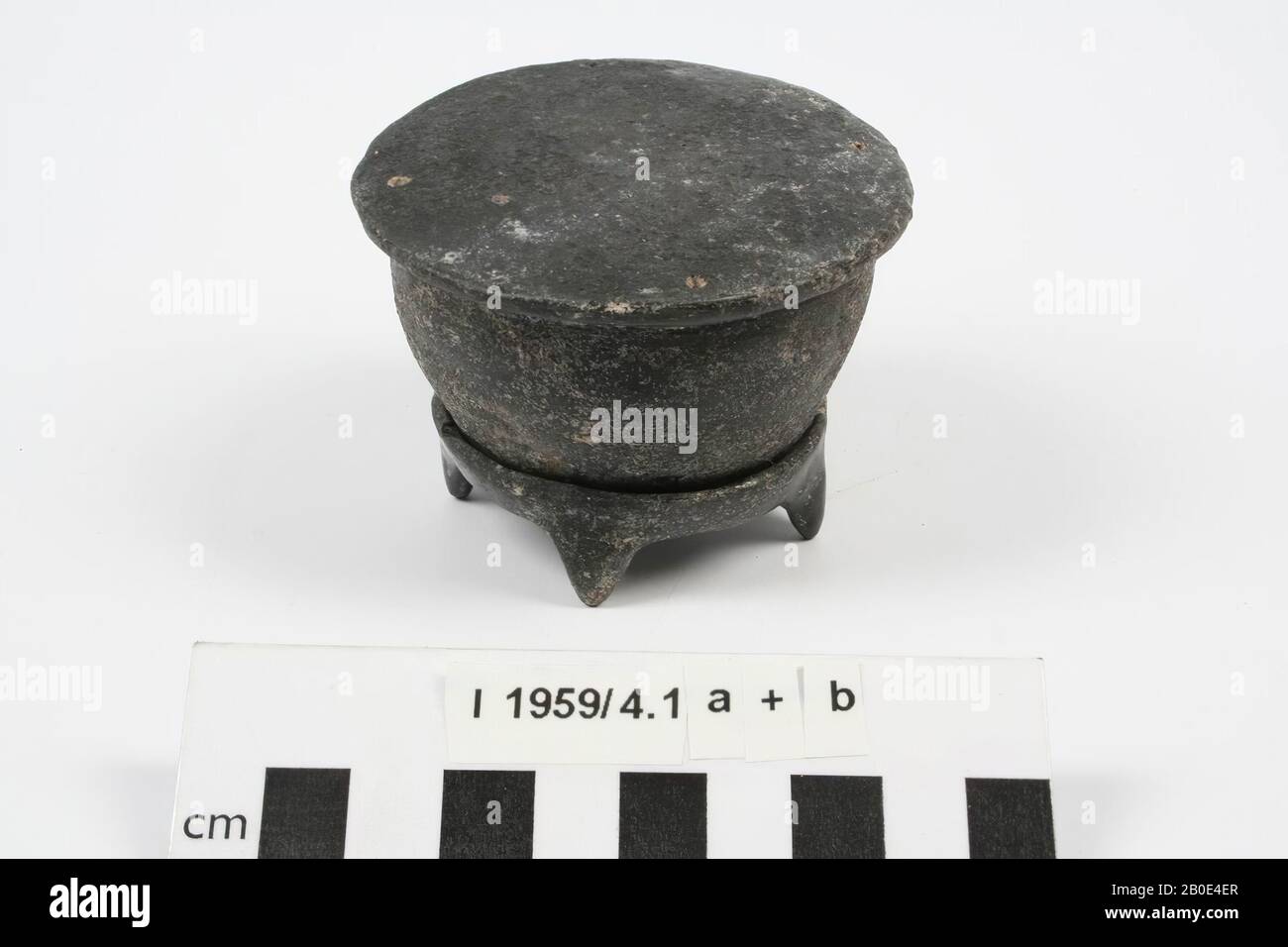 The base of a round earthenware box with lid, pyxis., Crockery