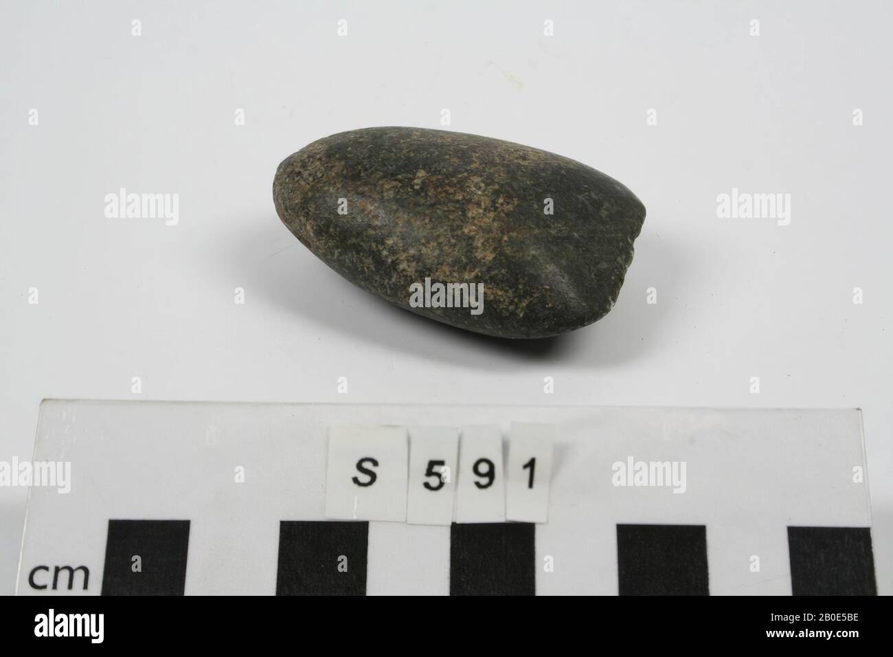 A wedge-shaped stone ax, updated to the silk sphere., Tools, weapon, stone, serpentine, L 5.6 cm, Turkey Stock Photo