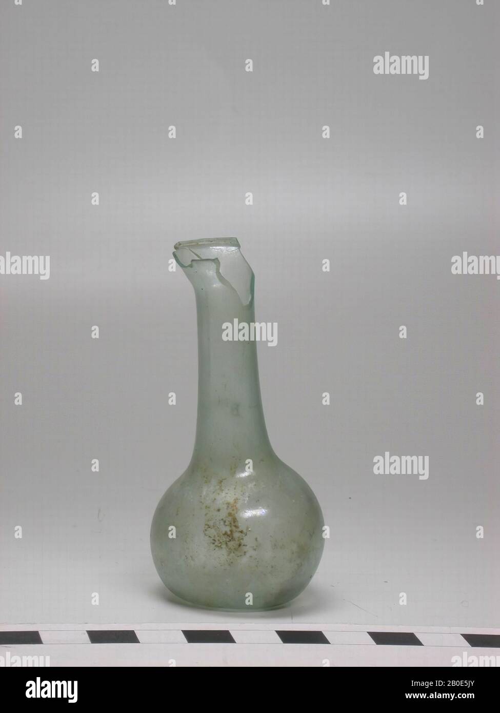 Spherical bottle with long neck that runs in funnelshaped fashion