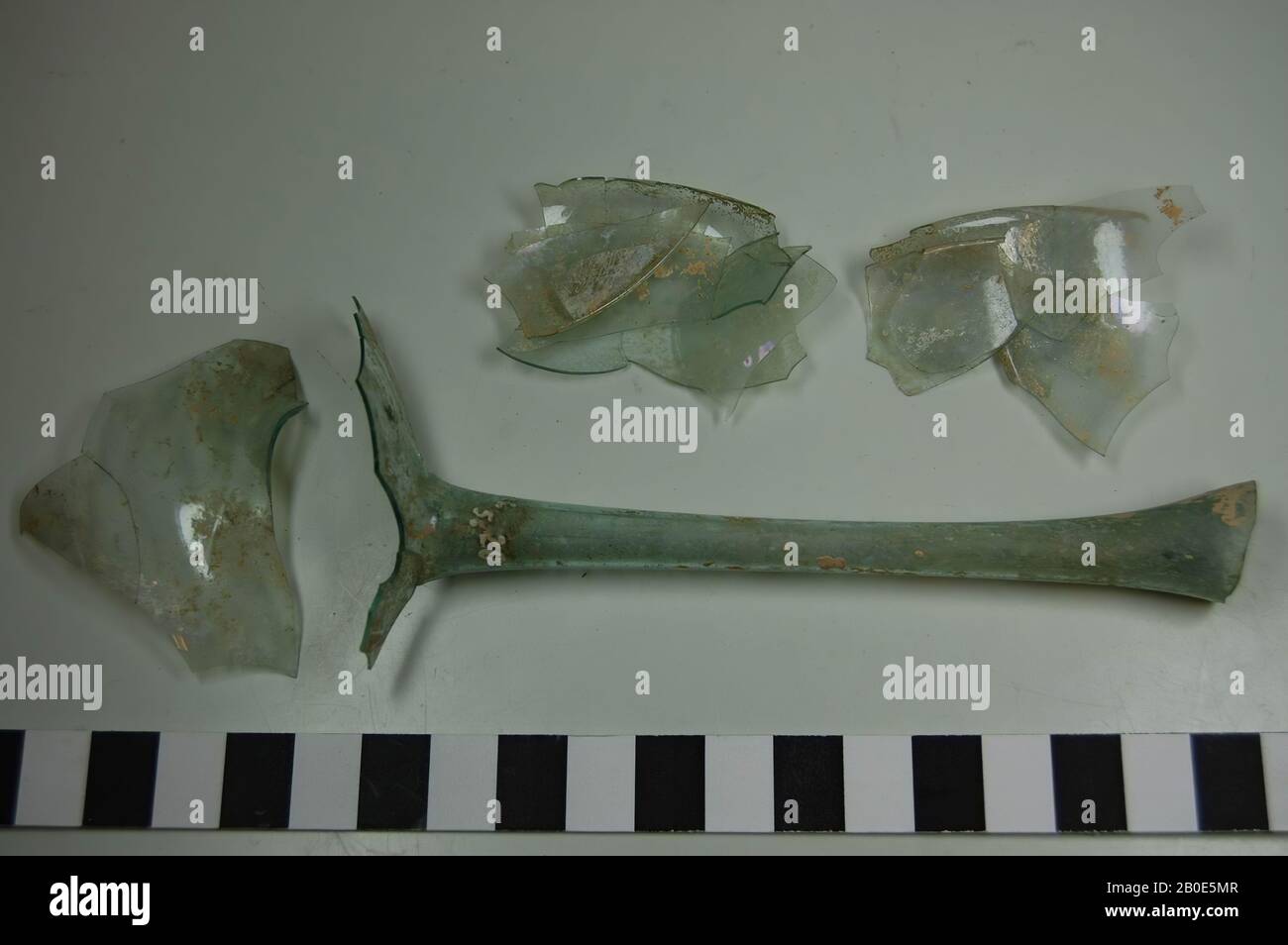 Bottle with long, narrow neck and flat, disc-shaped belly. Broken, crockery, glass, H 14.3 cm, D 8.2 cm, Israel Stock Photo