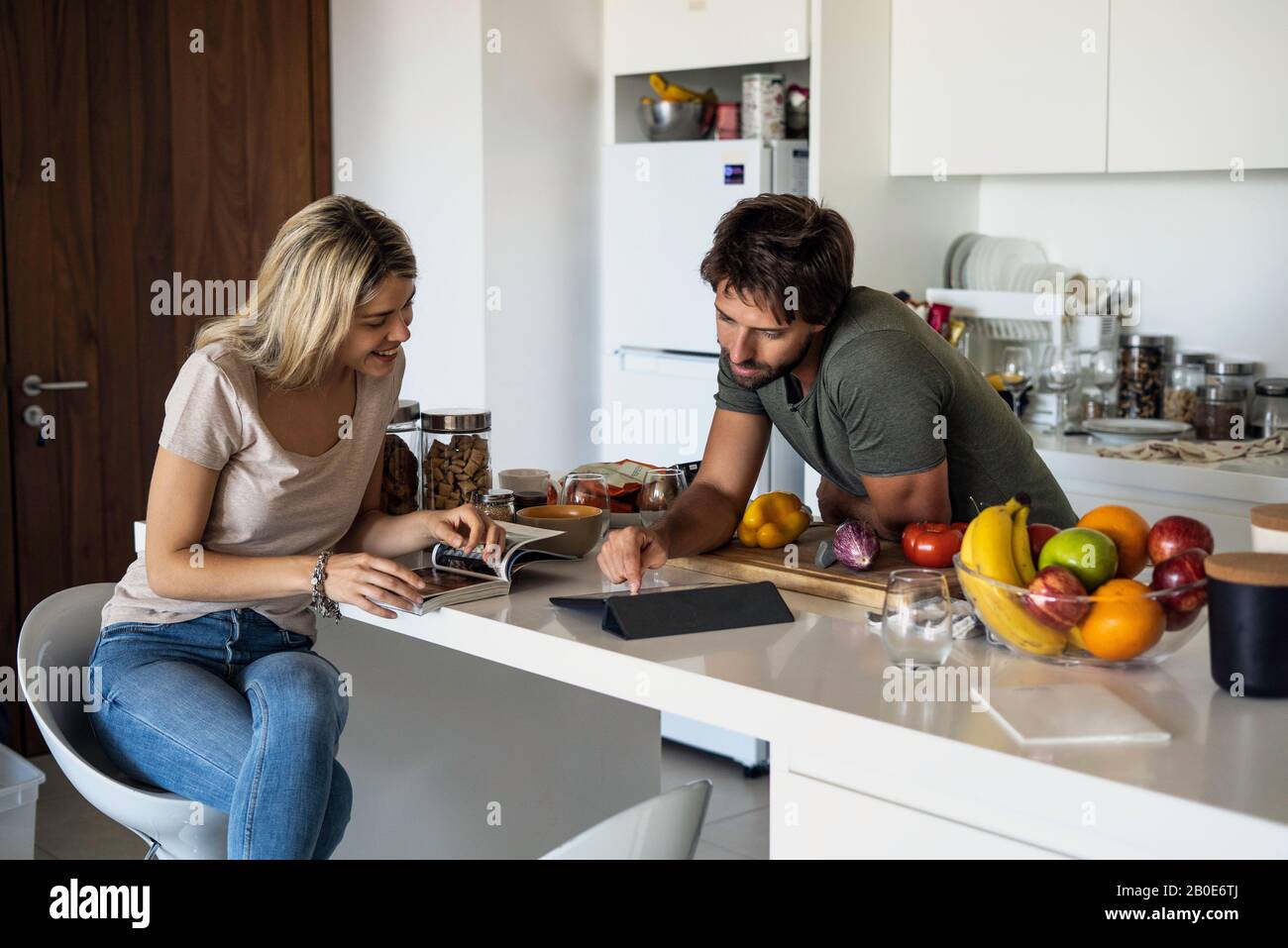 Couple using digital tablet Stock Photo