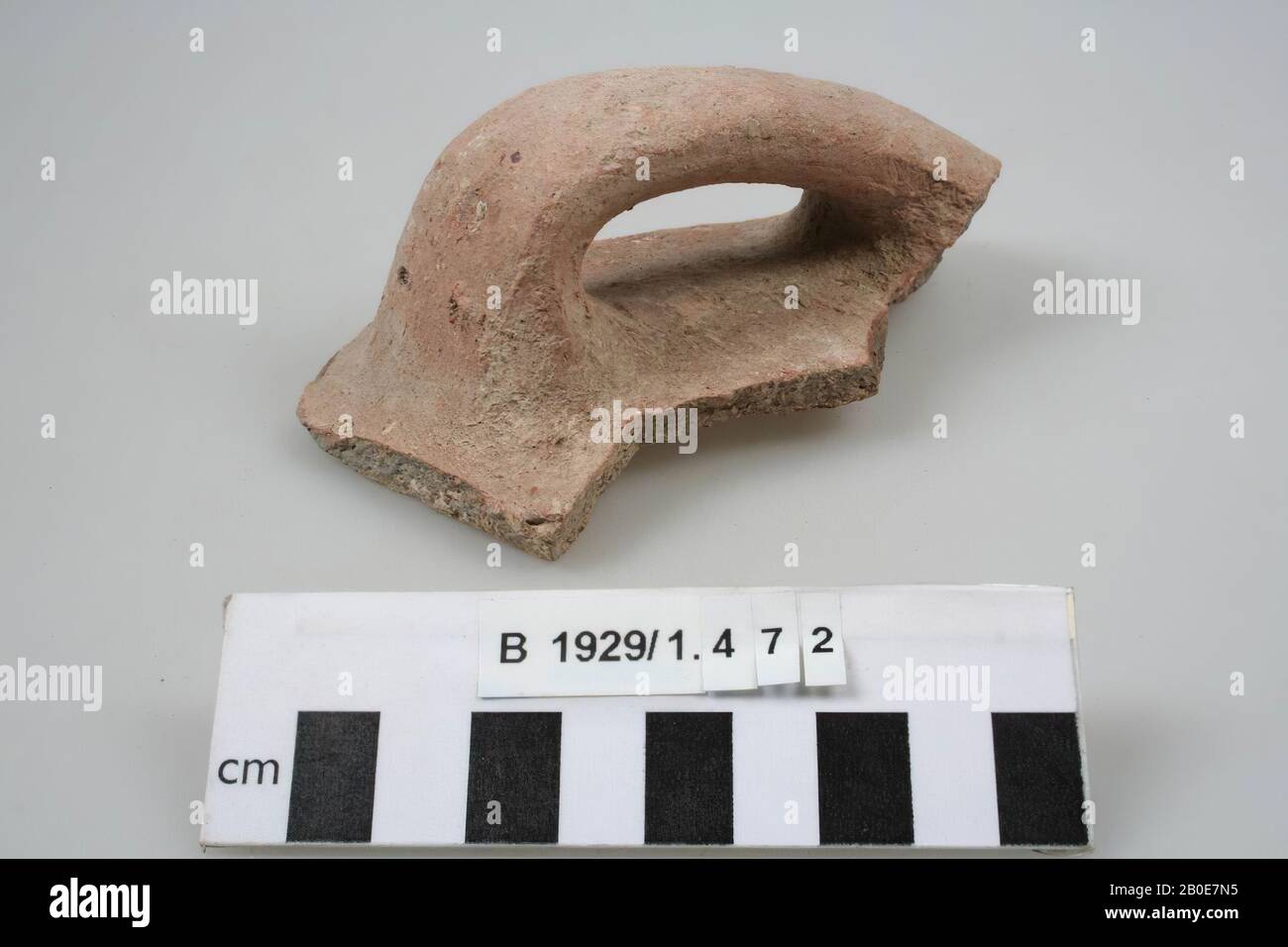 An ear of a jug, marked with two dots., Crockery, earthenware, L 13 cm, Palestine Stock Photo
