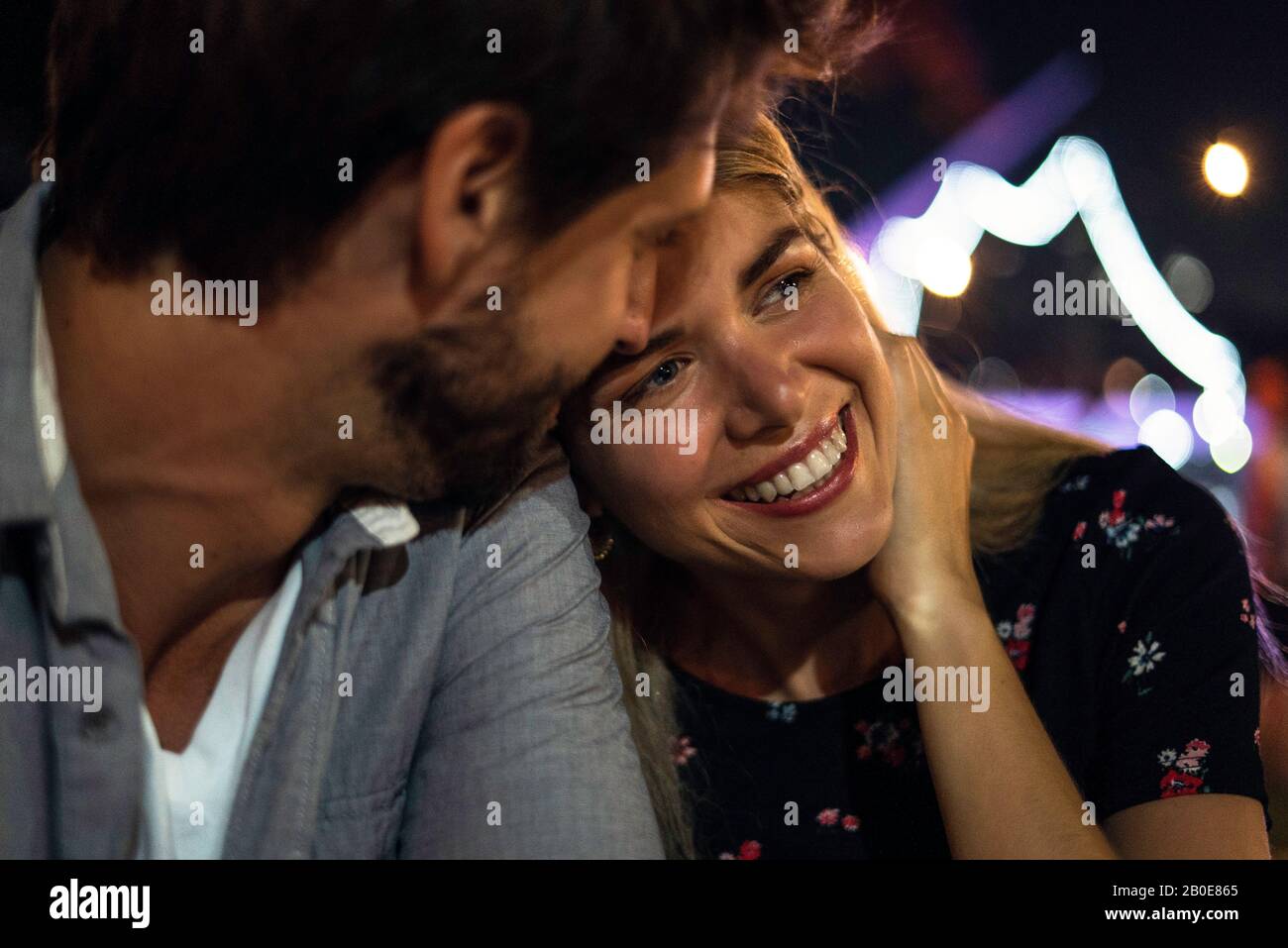 Man woman couple sitting hi-res stock photography and images - Alamy