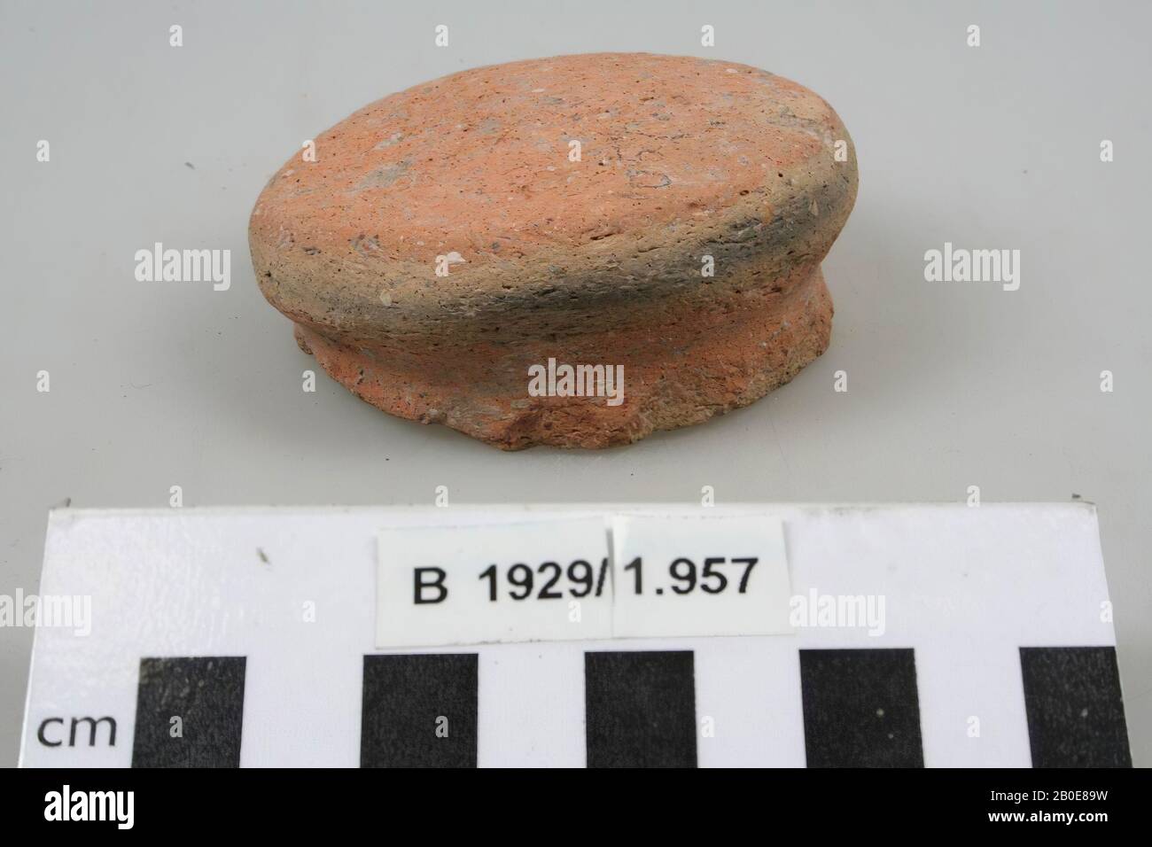 A bottom fragment of a jug, possibly reused as a lid., Crockery, earthenware, H 3.3 cm, D 7.3 cm, Palestine Stock Photo