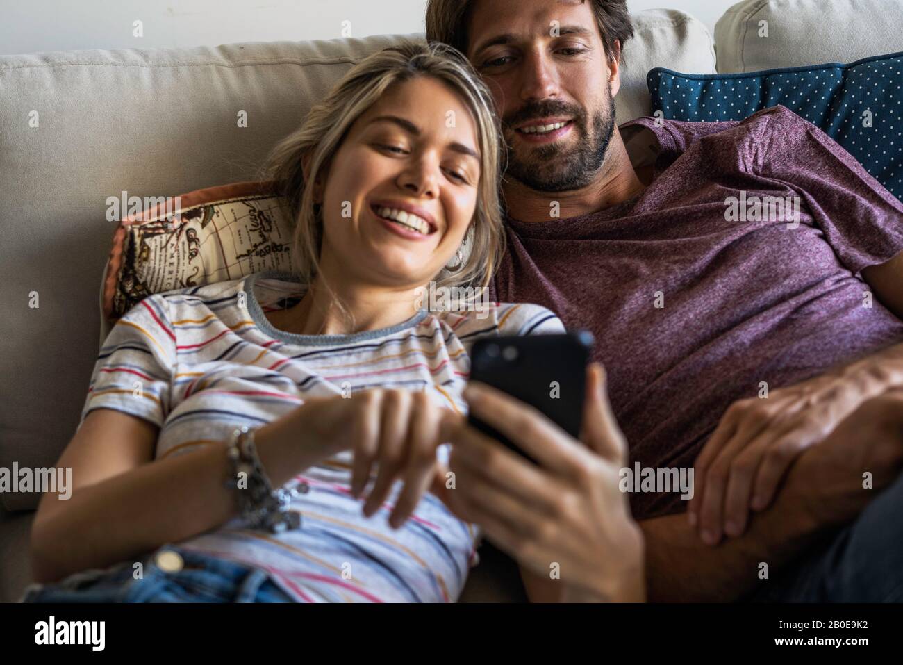 Couple using smart phone Stock Photo
