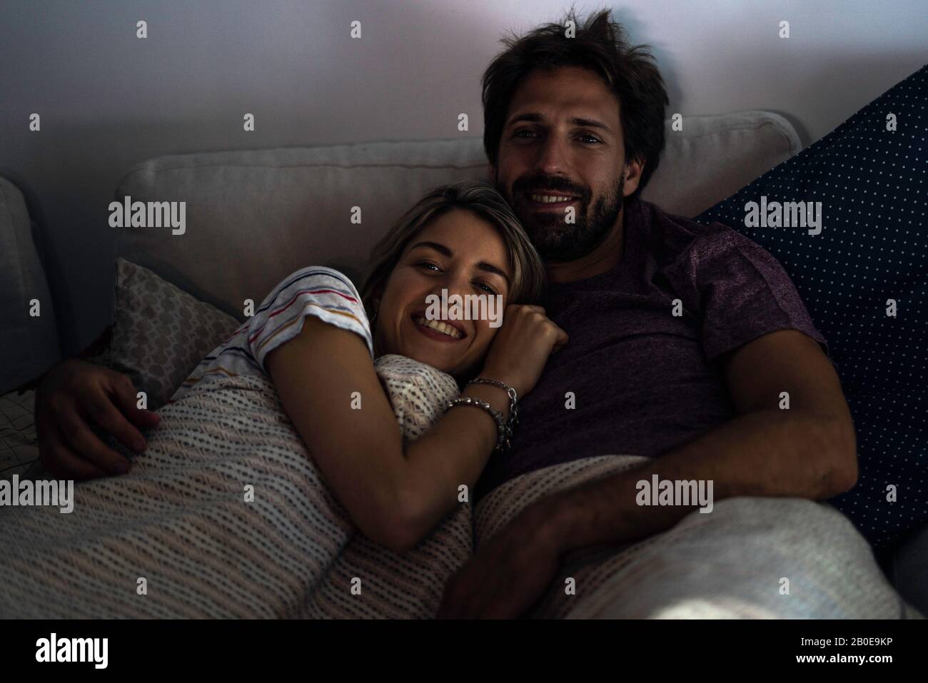 Happy woman relaxing home night hi-res stock photography and images - Alamy