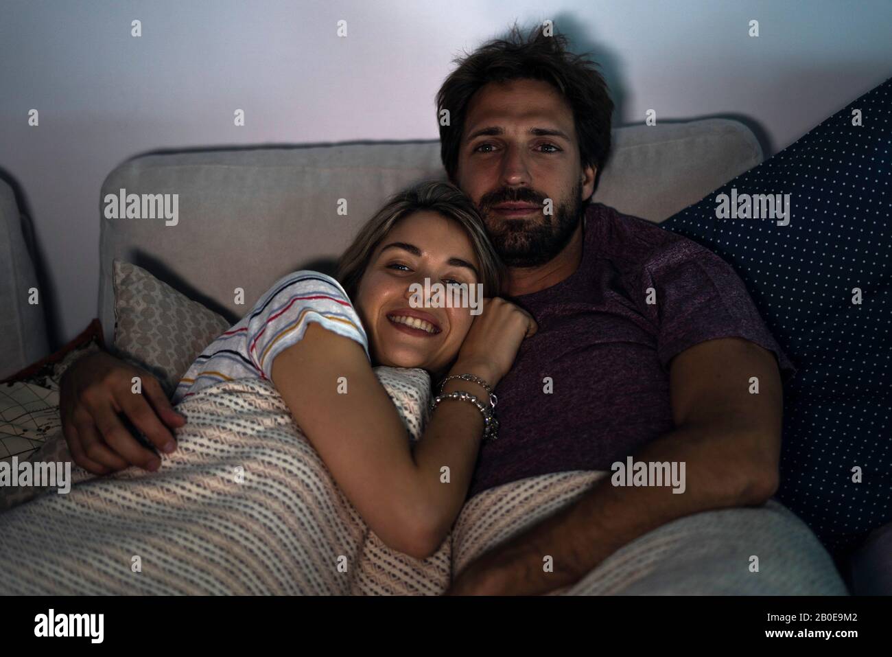 Happy woman relaxing home night hi-res stock photography and images - Alamy