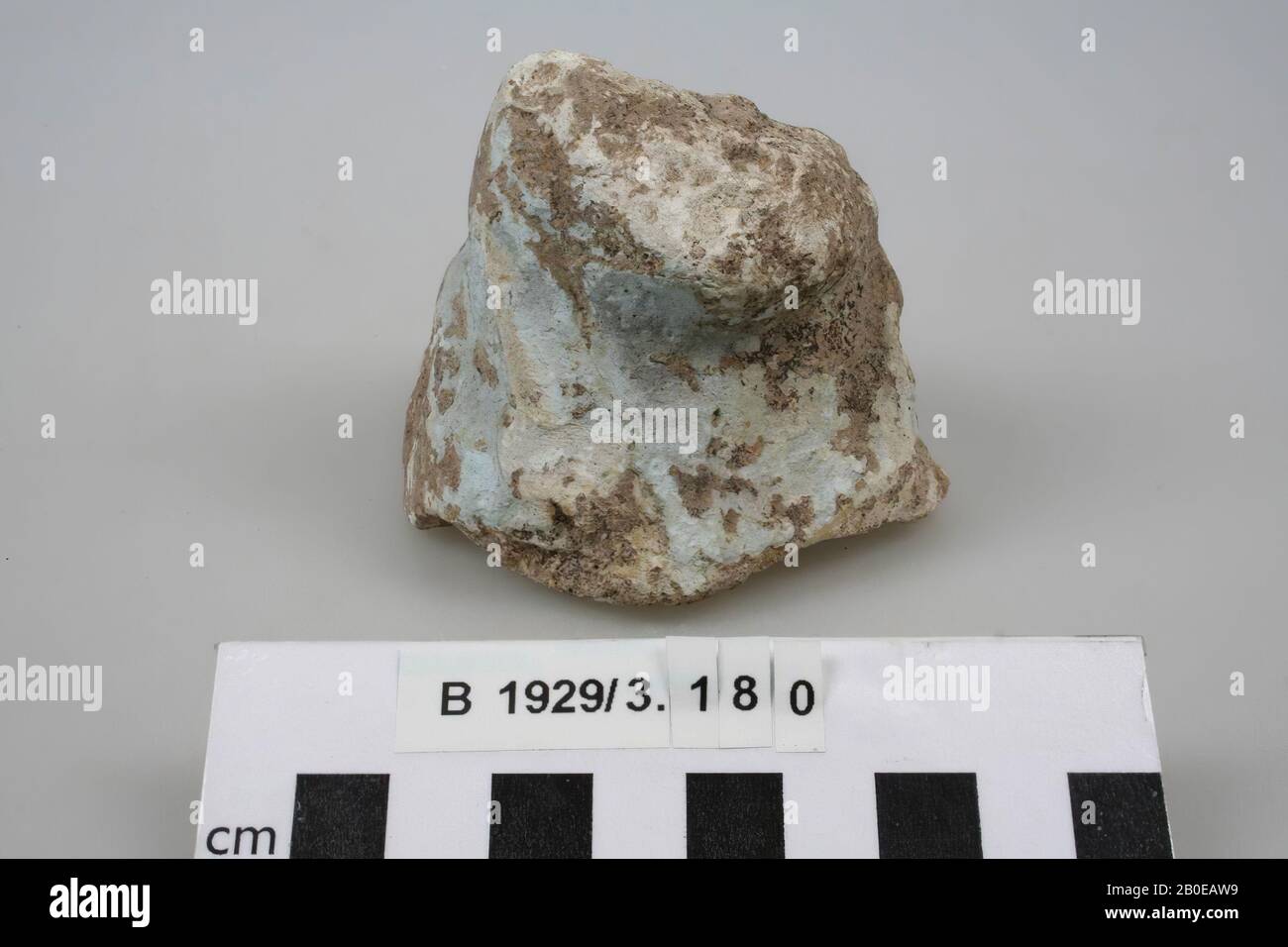 A fragment of a figurine (?), Very weathered and without recognizable shape., Figurine (?), Stone, limestone, faience (?), L 8 cm, W 7 cm, H 6.5 cm, Palestine Stock Photo