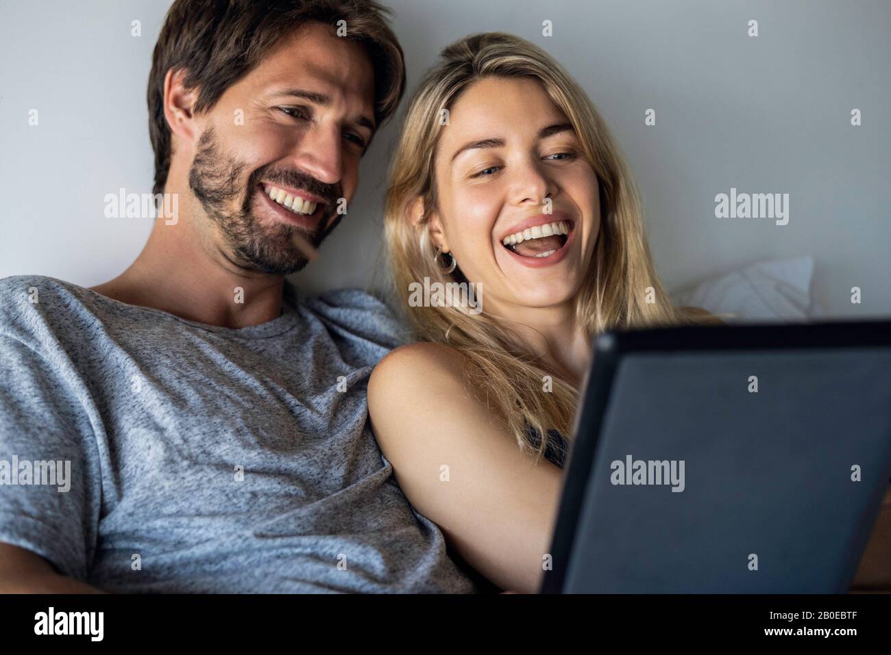 Couple using digital tablet Stock Photo