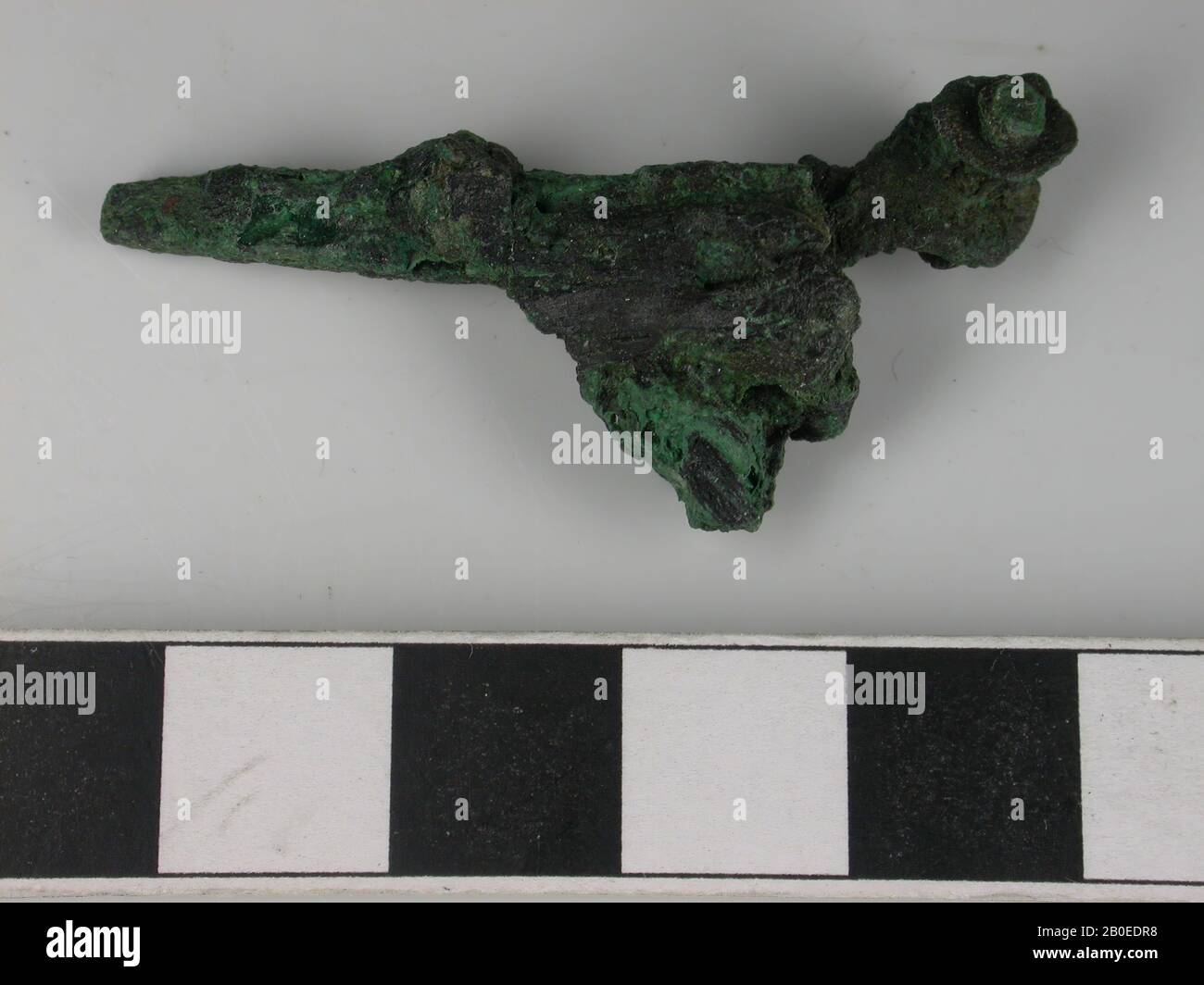 Bronze object, half molten (?)., fragment, metal, bronze, length: 4,3 cm, Netherlands, Utrecht, Bunnik, Fighting Stock Photo