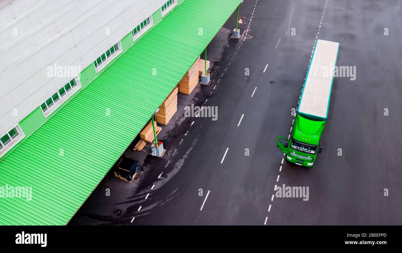 the truck is waiting for loading at the logistics center Stock Photo ...