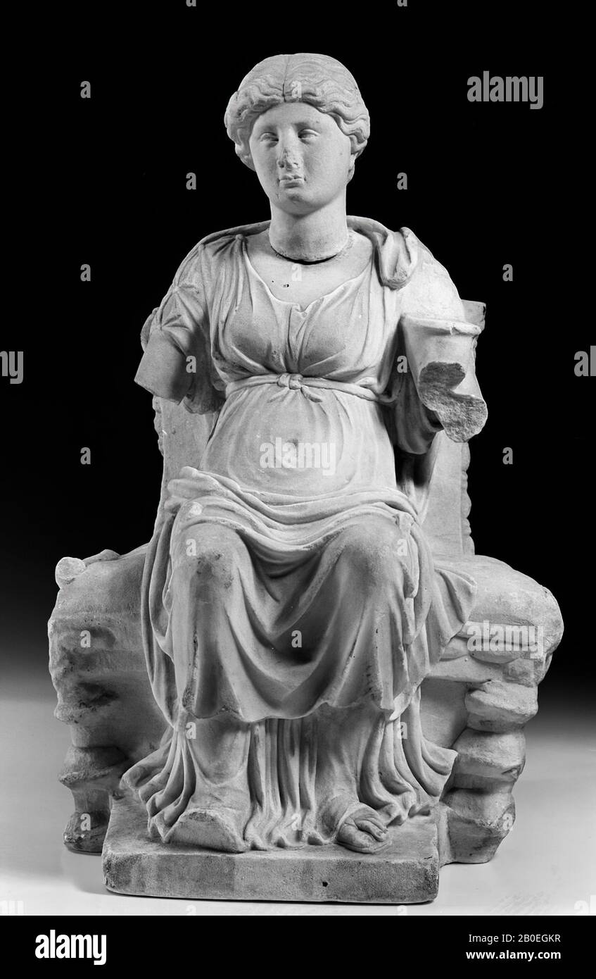 Figurine of a seated woman with not belonging cup. Horn of plenty and snake characterize her as the good goddess, Bona dea. Arms demolished, sculpture, stone, marble, 40 cm, imperial age 50 Stock Photo