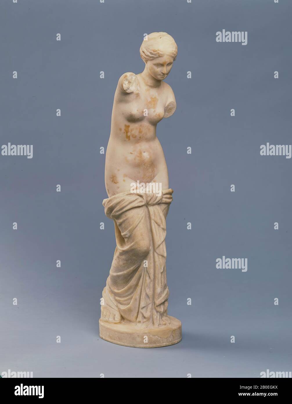 Statue of Venus, type Anadyomene. A cloth is knotted over the thighs, which falls on the feet. Poor missing. The statue is composed of different parts opus mixtum., Sculpture, marble, 68 x 15 x 10 cm, 25 kg, imperial 50-350 AD, unknown Stock Photo