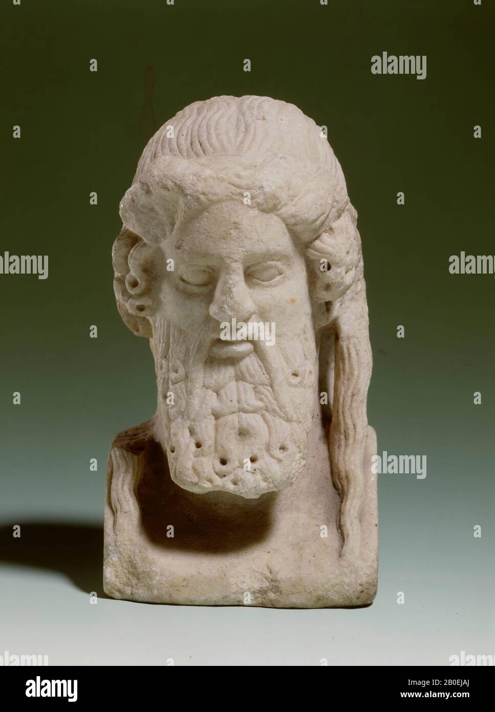 The piece appears to be a continuation of the original type of Alkamenes, but with modified head hair., Hermekop, marble, 20.2 cm, imperial time 0-200 AD, unknown Stock Photo