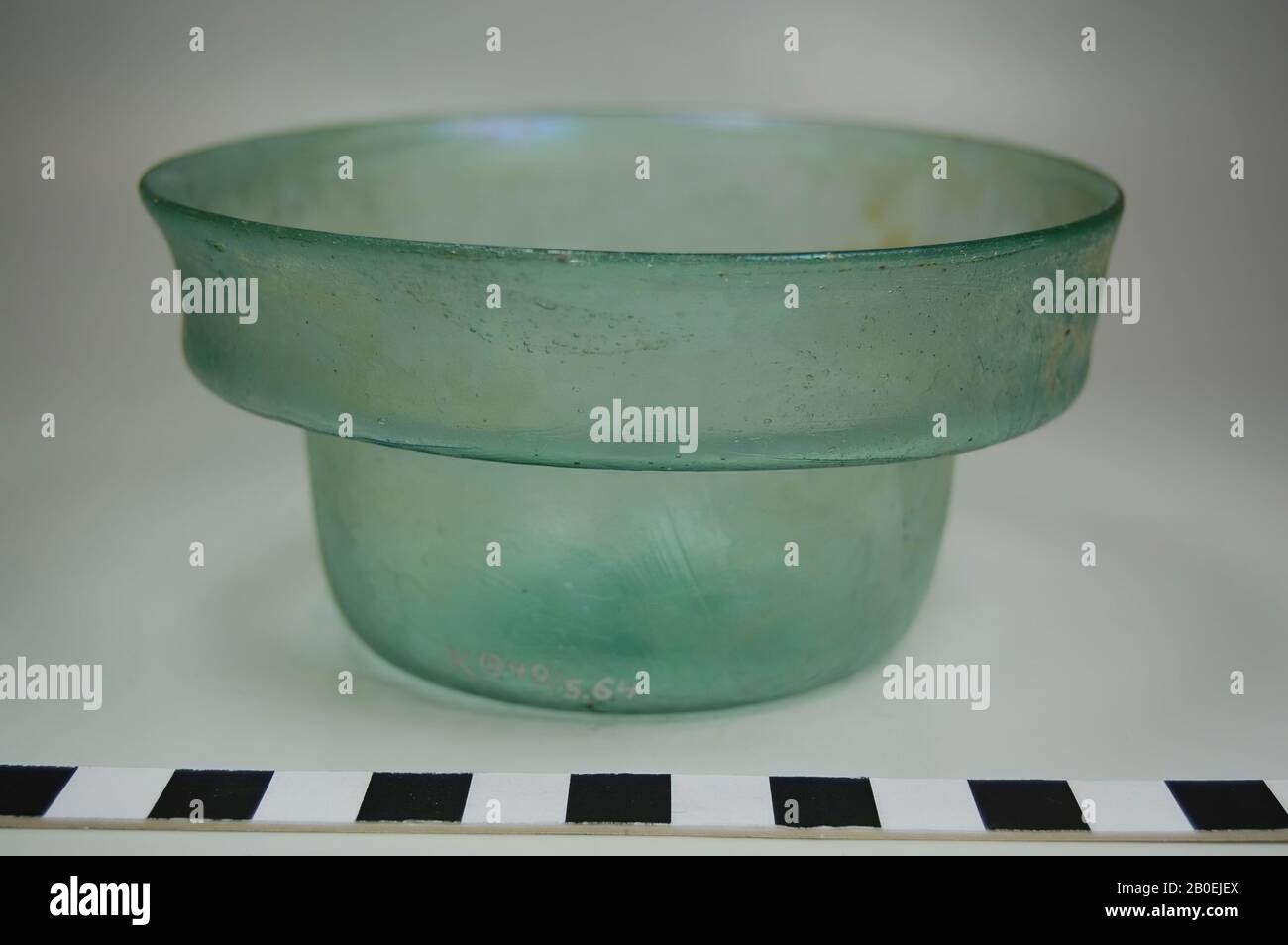 Bowl of greenish glass with outwardly protruding upright edge, plate, glass, 5.6 cm Stock Photo
