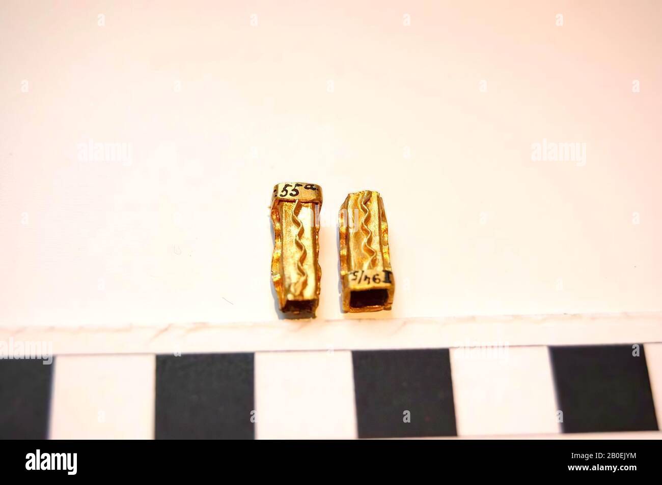 Golden square tubular beads with wavy gold thread on each side, buds, gold, 1.3 cm, Roman imperial time 0 Stock Photo