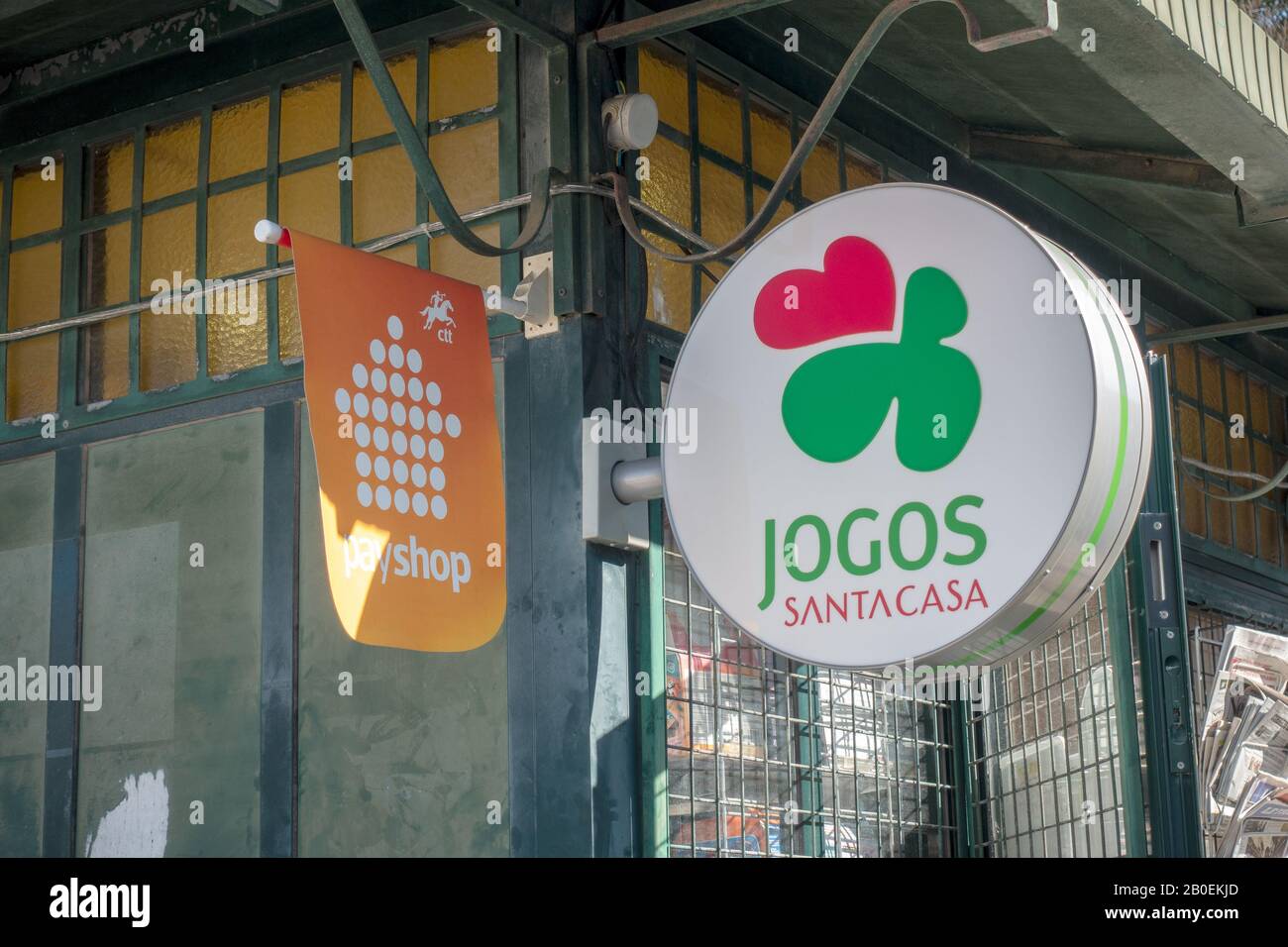 Portuguese Lottery Sign Jogos Santa Casa And Portugal Post Office CTT Pay  Shop Sign Outside A Newsagents Shop In Tavira Portugal Stock Photo - Alamy