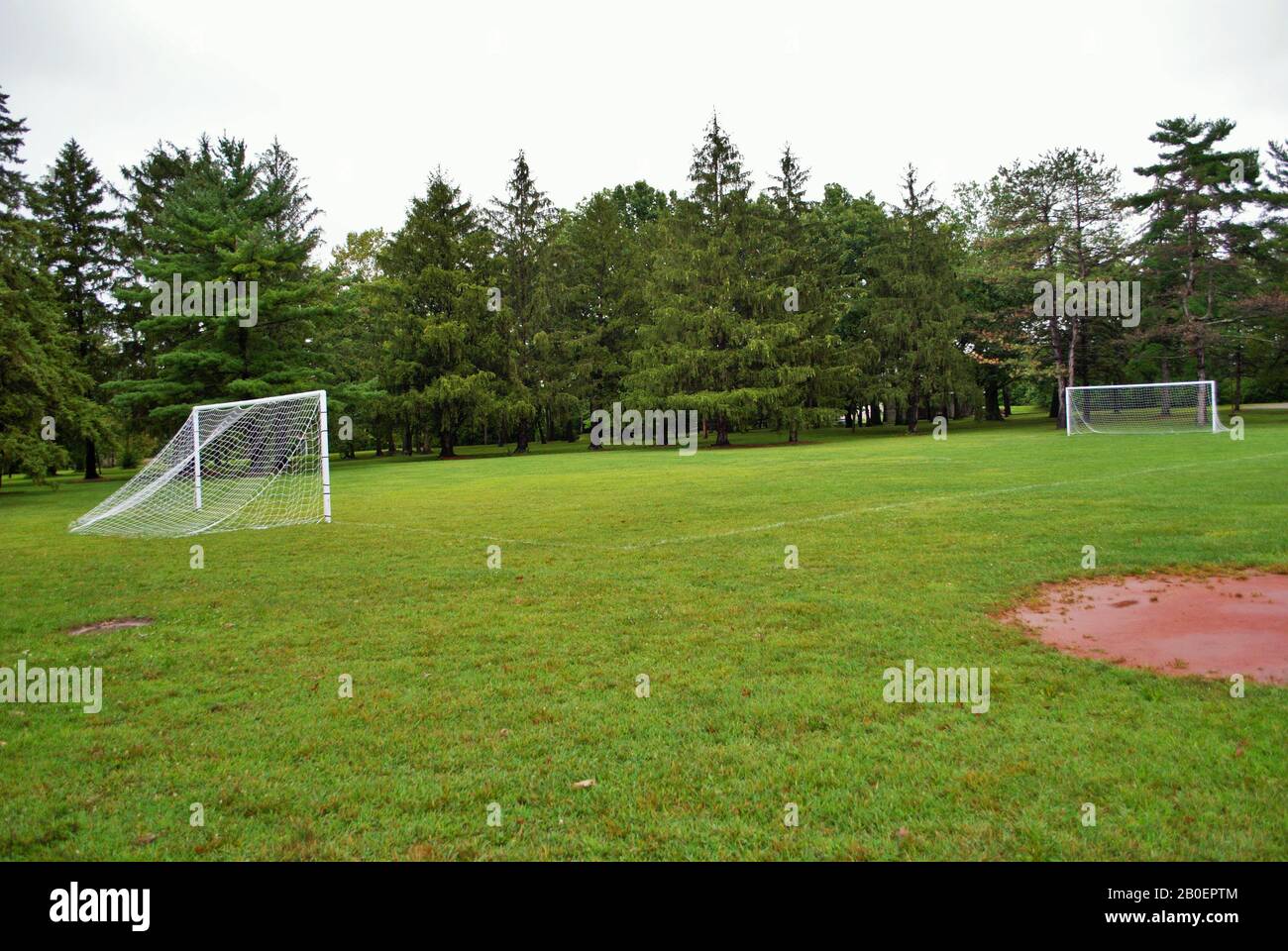 empty soccer field football pitch in a park Stock Photo