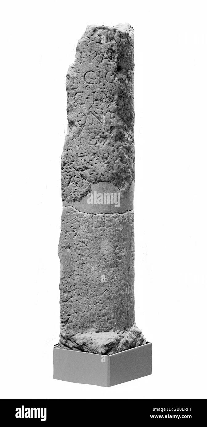 Two pieces of a Roman landmark of sandstone, with inscription. In the name of Emperor C. Messius Quintus Traianus Decius (249-251) follows the indication of the distance: --- CANANEFATV --- AB? --- F? LEVG. The number of leugae not indicated. Maybe it was marked with paint. The place mentioned is Forum Hadriani, the capital of the Cananefates. The inscription has been read by J.E. Bogaers., Milestone, stone, sandstone, H. total: 215 cm (pieces 66 96 cm), diam. 44 cm, pedestal H. 48 cm, 40x30 cm, roman 150-250, the Netherlands, Zuid-Holland, Rijswijk, Rijswijk, Kleiweg Stock Photo