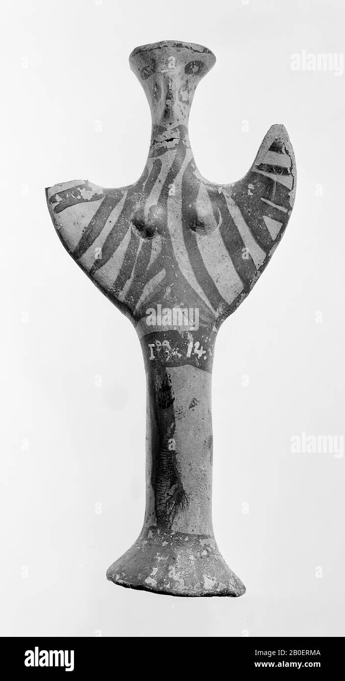 Mycenaean LH III psi-figurine. Mycenae, LH III terracotta idol of the psi type with red stripes on a yellow background. One hand is missing., Figurine, idol, psi idol, pottery, terracotta, 118 cm, late-Helladic III -1300 Stock Photo