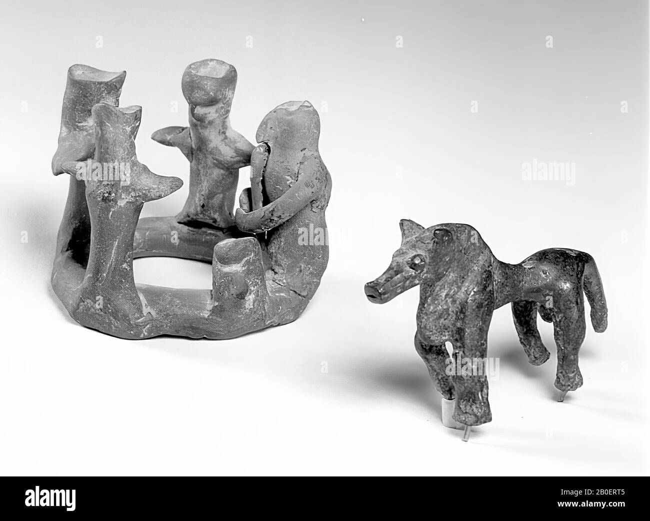 Geometric terracotta figurine group consisting of 3 figures Stock Photo