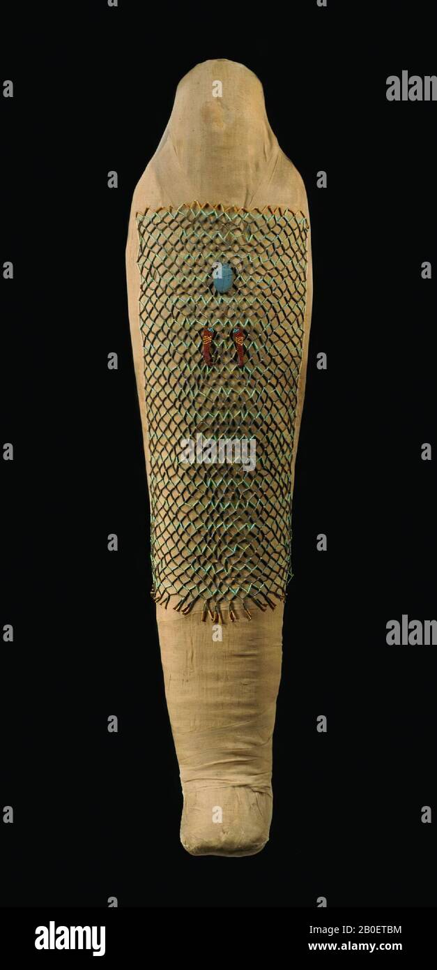 unknown, wade, beadnet, Mummy or an adult. The bandages are heavily covered with unevened linen, which is however much damaged at the rear. This shroud is a hero in position by a number of linen straps or 4.7-5.5 cm wide: a 'stole' crossed over the shoulders, one transverse band first passing over the abdomen, then wound around the back at an angle to reappear as a transverse strap over the thighs, passing around in a triple band around the ankles. The bandages are partly visible on the back, where a band with long fringes juts out of the damaged shroud. There are some dark stains on the back Stock Photo