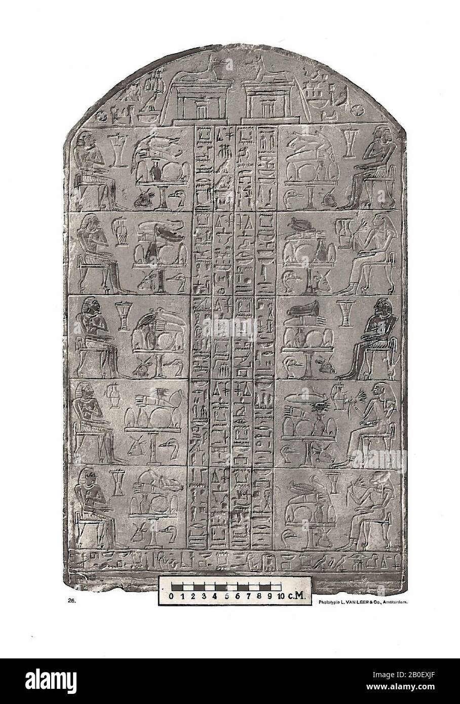 miscellaneous, round bow, This on this round bower does not seem to be made by order of one specific person: a total of ten men and women are depicted. The top is decorated with two jackals seated on a shrine. The stela is divided into ten planes that are always separated in the middle by four lines of inscription. These text lines are offer formulas, addressed to the gods Osiris and Wepwawet, among others. Every person depicted sits on a chair in front of a sacrificial table. The three women all have a lotus flower in their hand, the seven men a piece of double folded fabric., The stela has Stock Photo