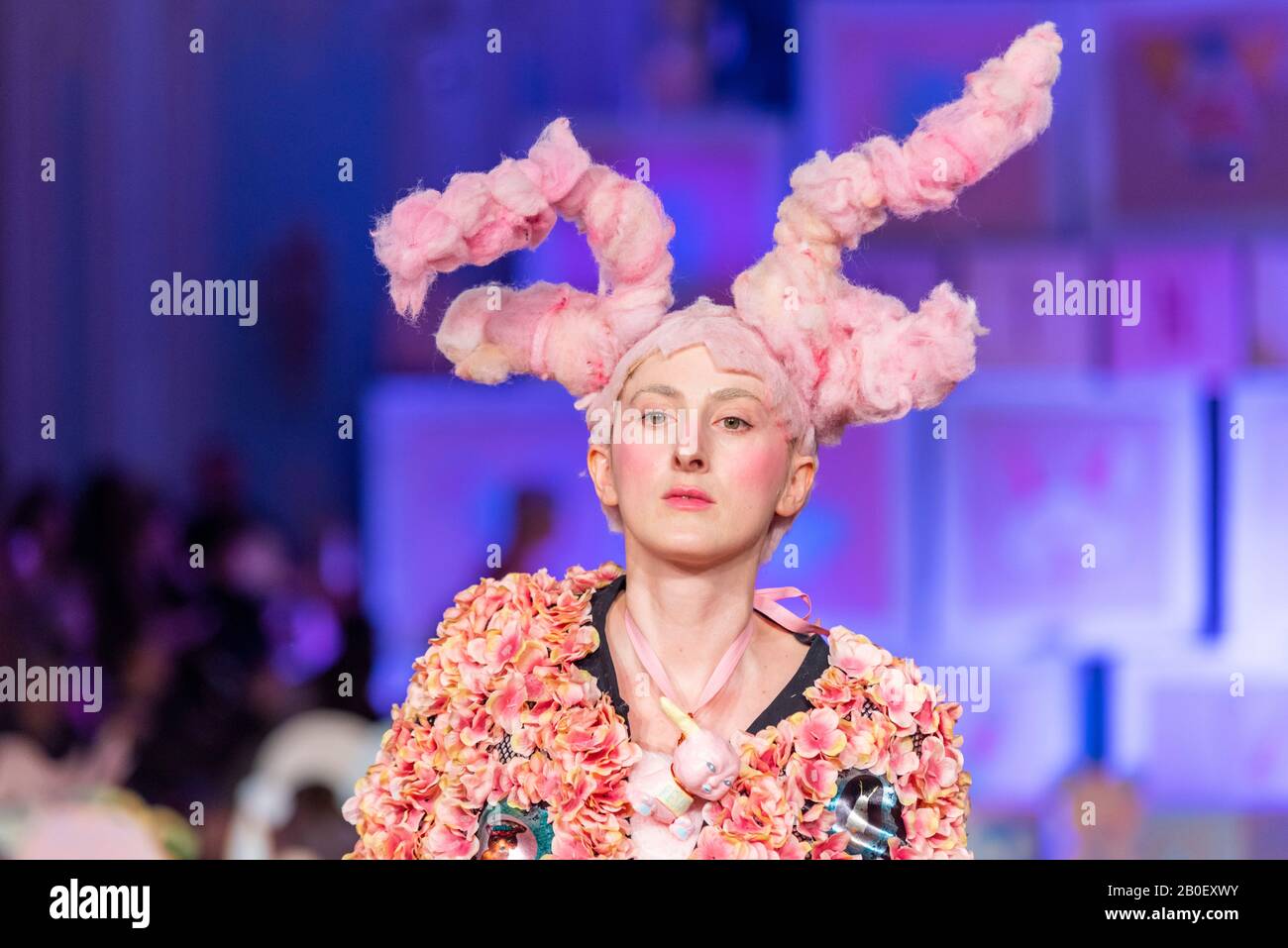 Vin and Omi London Fashion Week Resist AW20 show. Eco friendly clothing designed from recycled fabric and weeds from Highgrove estate. Pink Stock Photo