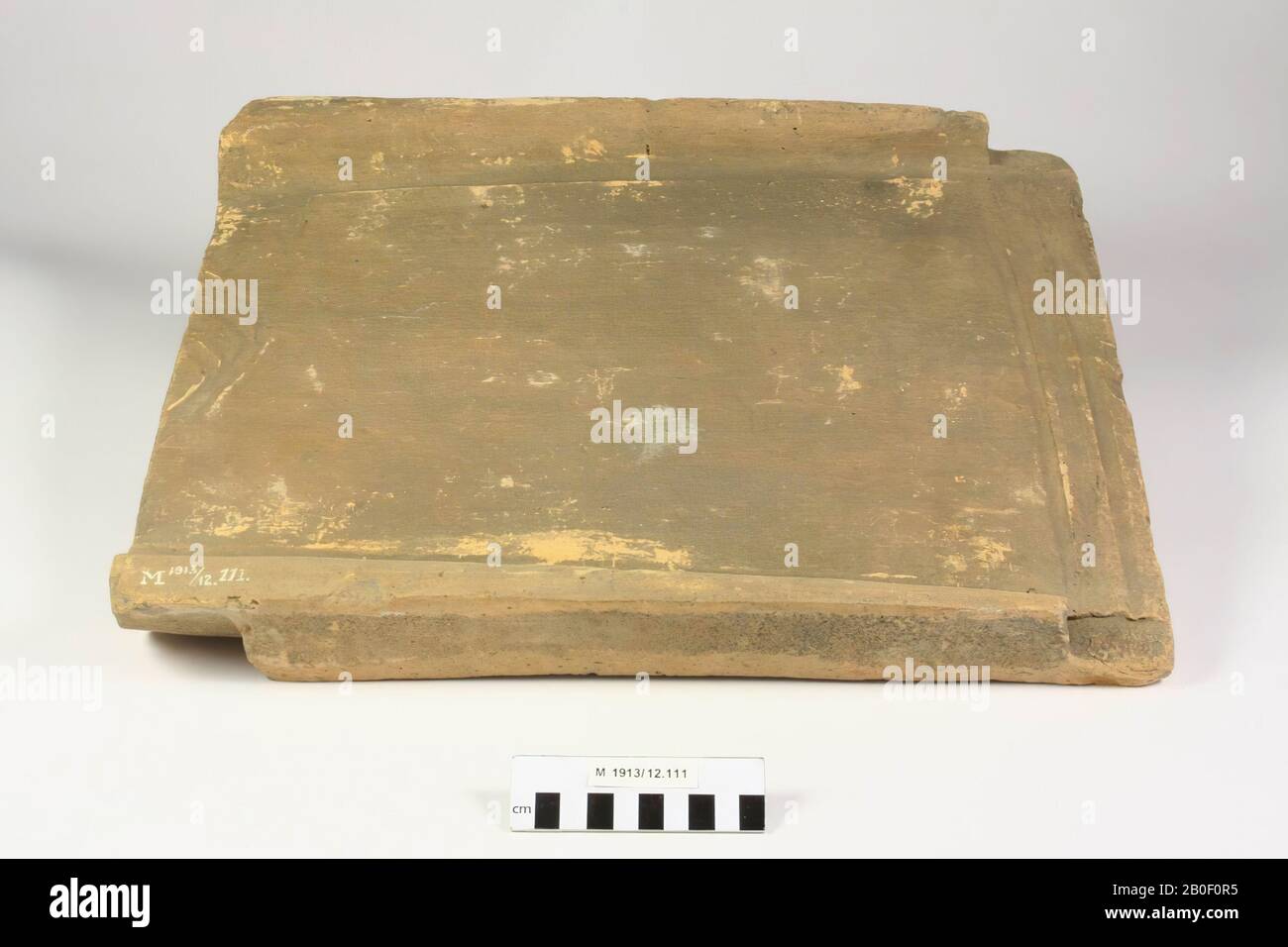 Large roof tile with which a grave has been constructed., Roof tile (tegula), earthenware, brick, 5,2 x 36,3 x 46 cm, roman, Germany, unknown, unknown, Rheinzabern Stock Photo
