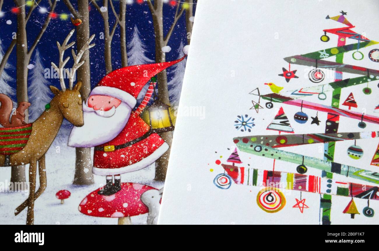 The covers of two Christmas or Xmas cards, including images of Father Christmas with a reindeer and an Xmas tree Stock Photo