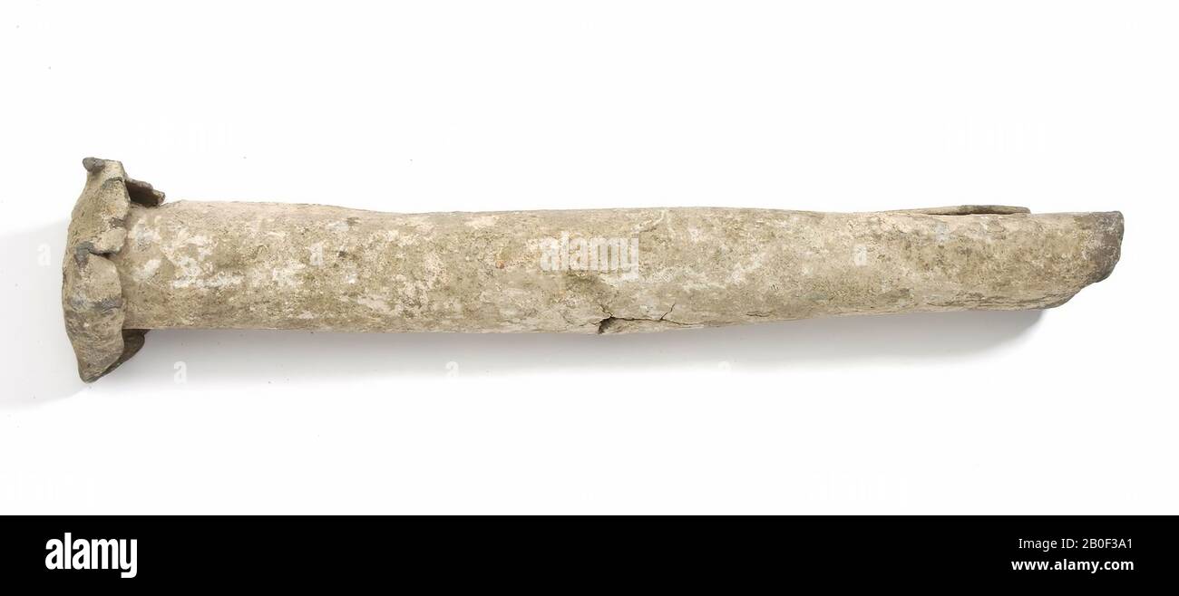 Fragment of a lead pipe or tube with wide, curled edge and longitudinally provided with a diameter, tube, water pipe, metal, lead, Roman 1-300 AD, Netherlands, Gelderland, Berg en Dal, Berg and Dal, De Holdeurn Stock Photo