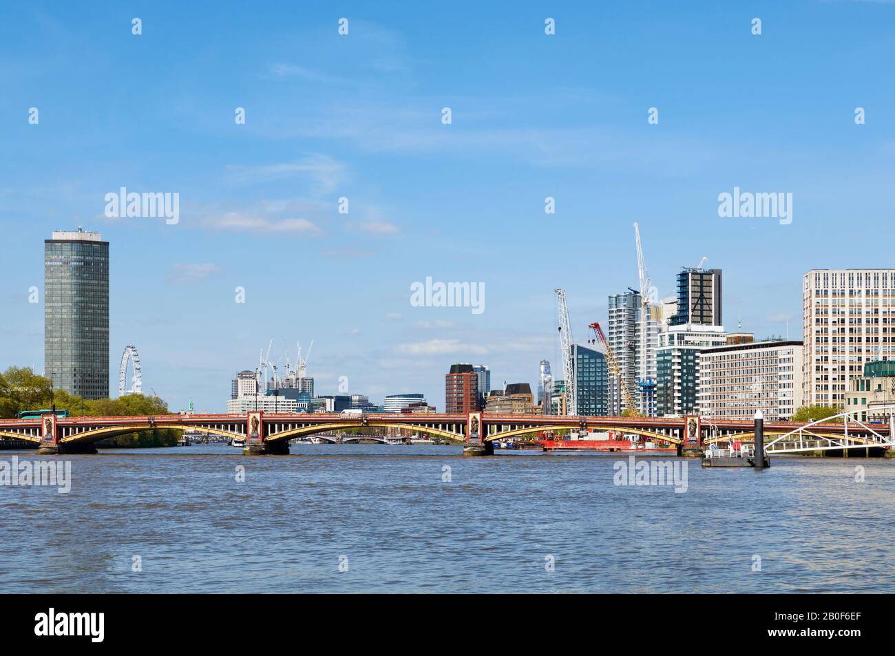 Vauxhall Bridge on the River Thames, London UK, and surrounding buildings Stock Photo