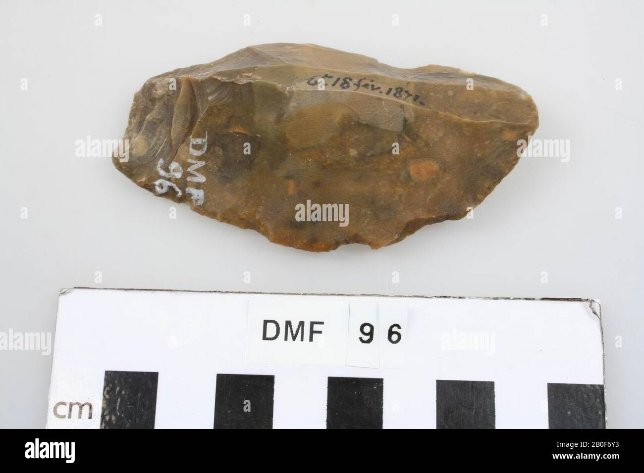 Elongated piece of flint scraper, chopped., Scraper, stone, flint, 7,8 x 4 x 1,6 cm, prehistoric, France, unknown, unknown, Clichy Stock Photo