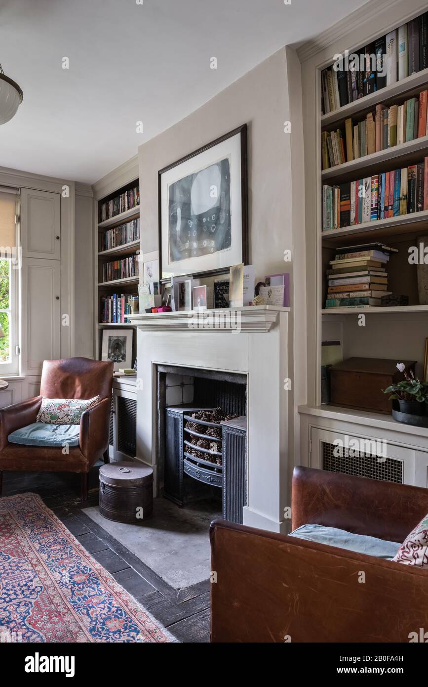 1962 lithograph above grate by William Scott with leather library chairs by Stephen Pardy. Stock Photo