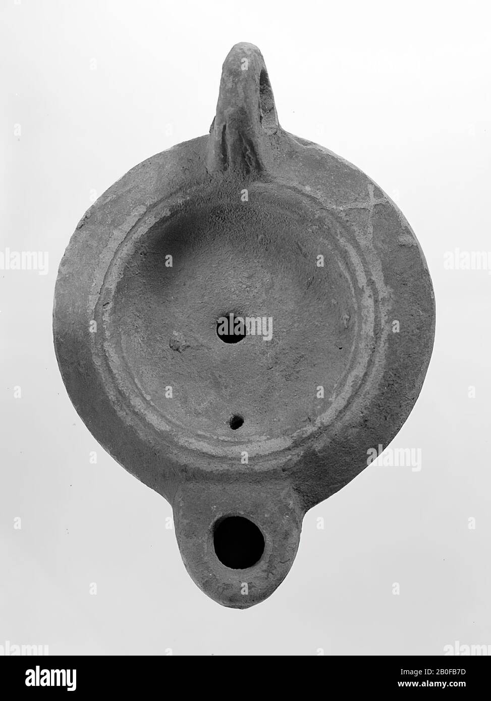 Classical antiquity, oil lamp, earthenware, terracotta, 4.4 x 10.3 x 7.2 cm, 2nd half of 1st century to 1st half of 3rd century AD., 50-250 Stock Photo