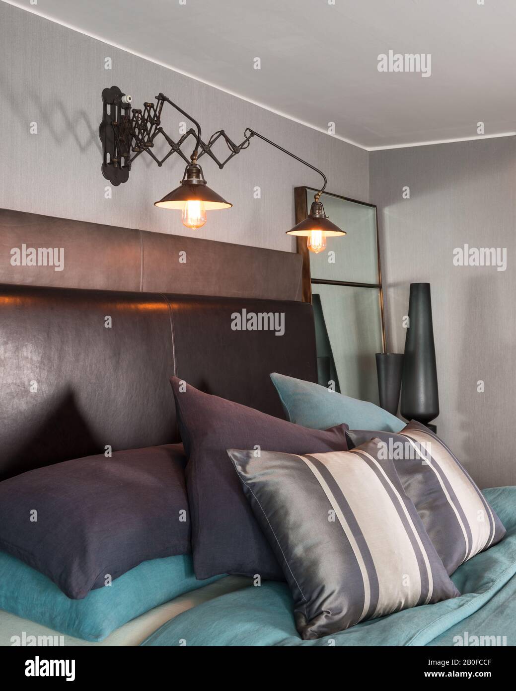 wallpapers Hanging Leather Headboard https www alamy com lit anglepoise lam above bed with brown leather headboard in modern west london apartment image344546399 html