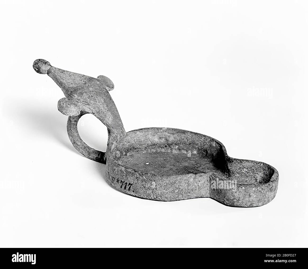 Bronze handle of a box or the like. The eye bolts, in which it moved, are both still present., Handle, metal, bronze, 5 x 13.5 cm, roman 15-250, the Netherlands, Utrecht, Bunnik, Vechten, Houtense Vlakte Stock Photo