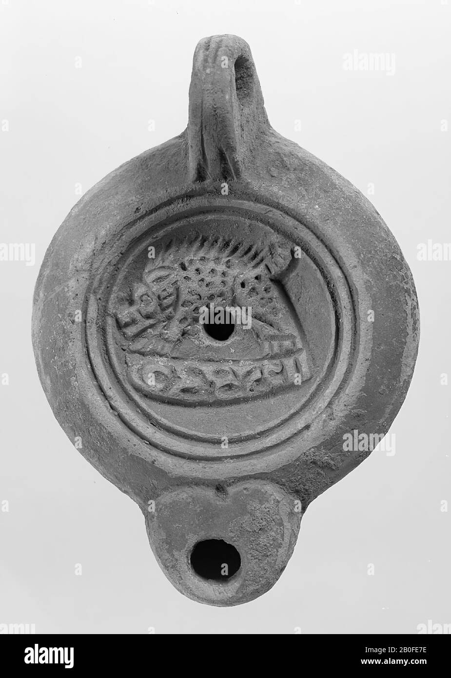 Classical antiquity, oil lamp, earthenware, terracotta, 4.1 x 9.6 x 6.6 cm, 2nd half of 1st century to 1st half of 3rd century AD., 50-250 AD, Tunisia Stock Photo