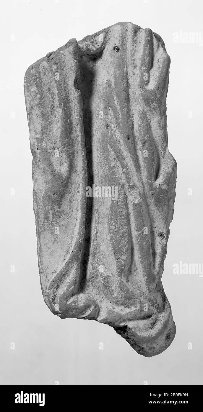 Figurine (front). Middle fragment of female figure with pleated robe. MEK Cat. nr (not stated)., sculpture (front), earthenware, terracotta, height: 11 cm, lmeb 1425-1475, Netherlands, South-Holland, Leiden, Leiden, Barbara-school Stock Photo
