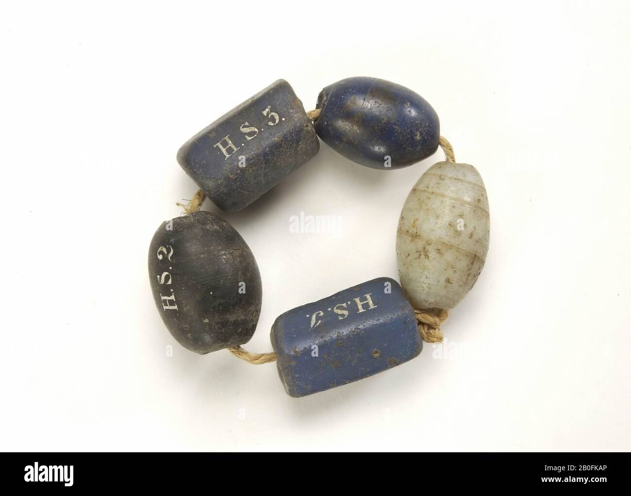 This bead belongs to the other HS No. 4-5. brand, G V 256., bead, rod bead, glass, height: 1,6 cm, 16th-17th century 1500-1700, Netherlands, North Holland, Haarlemmermeer, Haarlemmermeer Stock Photo