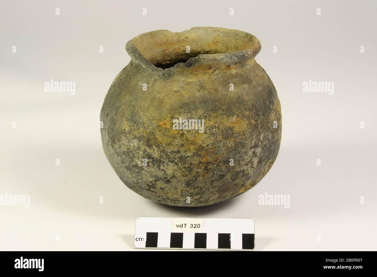 Ball pot with rust spots. Some parts of the rim are missing., Ball pot ...