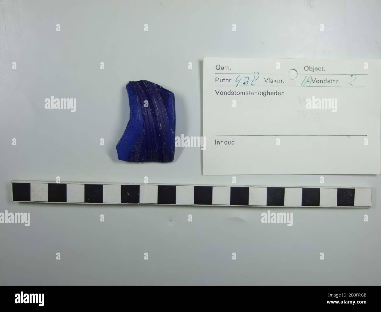 glass fragment, 1 shard of edge, intensive blue, translucent glass mass ...