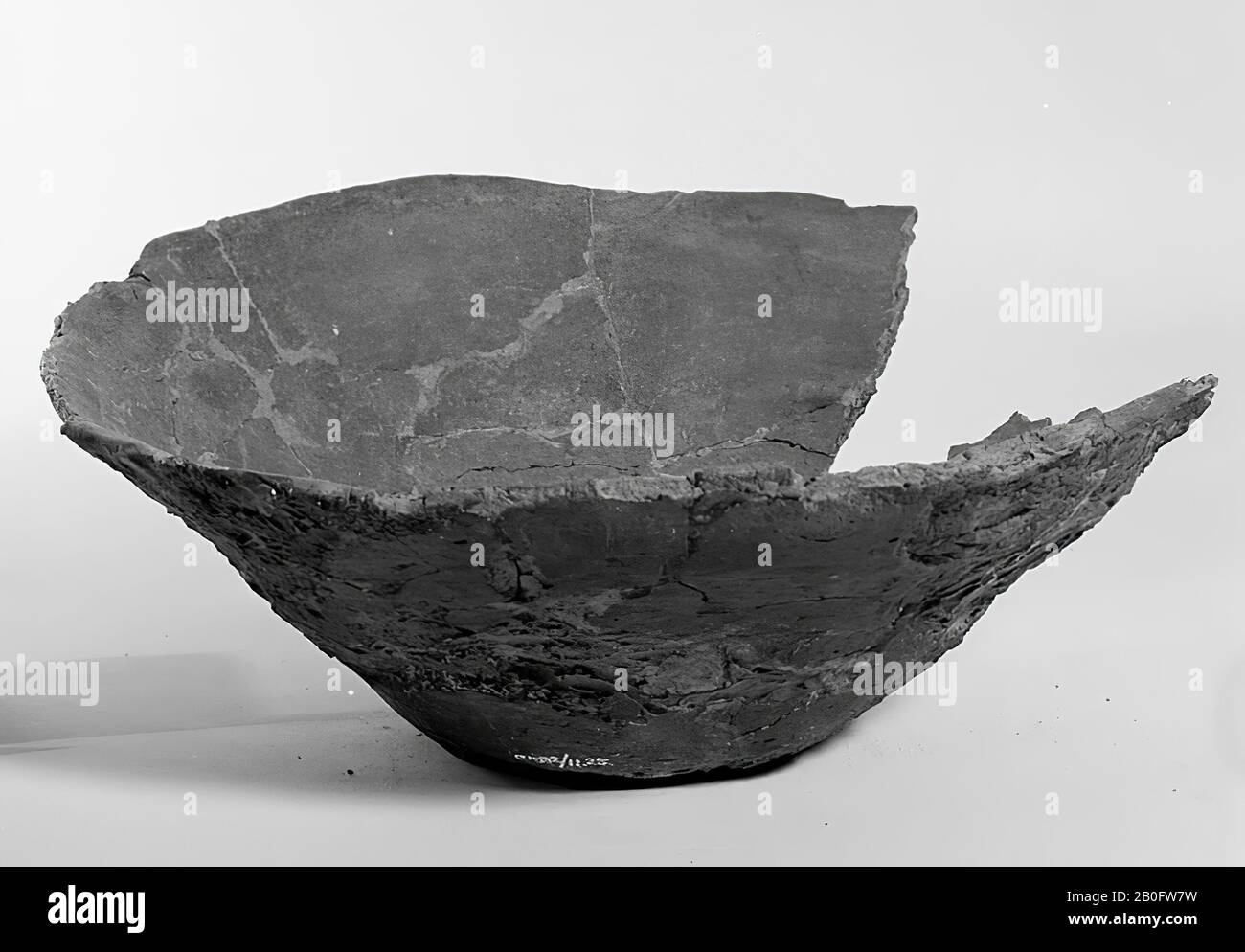 Wide bowl of earthenware, found as a lid on c 1932 Stock Photo