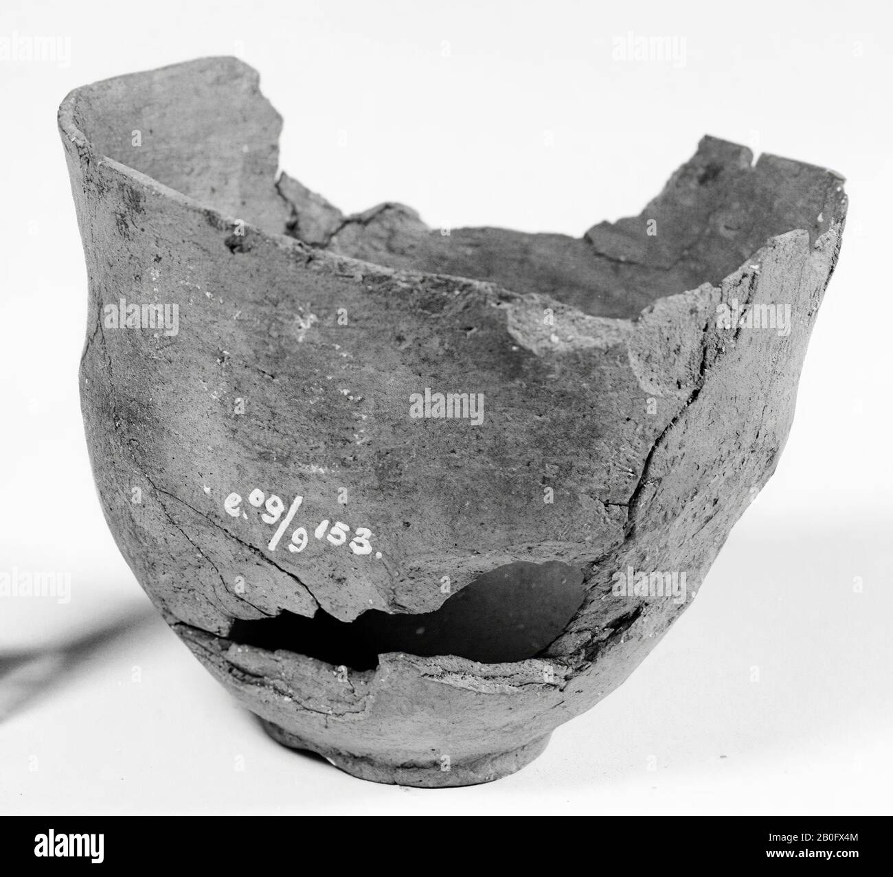 Small cup of thin-pottery earthenware. Has a peculiar bell shape with ...