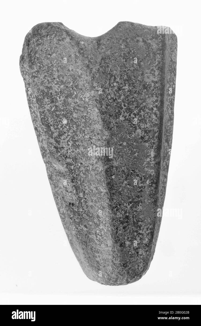 a point of heart stone with slits, broken off from a larger piece, just at the place where a round hole has been. The object is reminiscent of a fragment of a stone hammer with a hole, hammer, stone, length: 7.2 cm, prehistory -2900 Stock Photo
